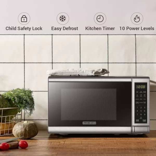 BLACK+DECKER EM031MB11 Digital Microwave Oven with Turntable Push-Button Door, Child Safety Lock, 1000W, 1.1cu.ft, Black &amp; Stainless Steel, 1.1 Cu.ft
