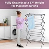 image:imageBLACKDECKER 4Tier Expandable Collapsible Clothes Drying Rack Telescopic Height Foldable SpaceSaving Laundry Air Dryer for Towels Shirts amp Delicates  Durable Steel No Tools NeededSilverGrey