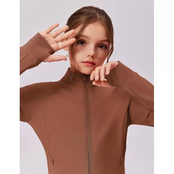 imageZaclotre Girls Fleece Jacket with 4 Pockets Long Sleeve Zip Up Warm Athletic Winter Coat Kids Sweatshirt for 514 YBrown