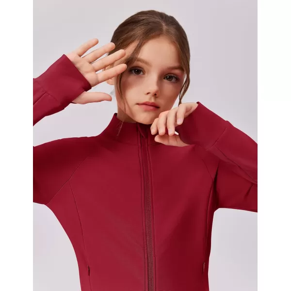 imageZaclotre Girls Fleece Jacket with 4 Pockets Long Sleeve Zip Up Warm Athletic Winter Coat Kids Sweatshirt for 514 YRed