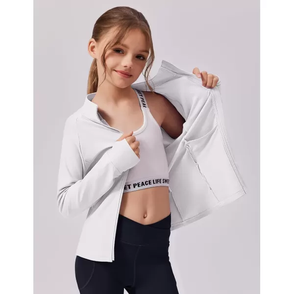 imageZaclotre Girls Fleece Jacket with 4 Pockets Long Sleeve Zip Up Warm Athletic Winter Coat Kids Sweatshirt for 514 YWhite