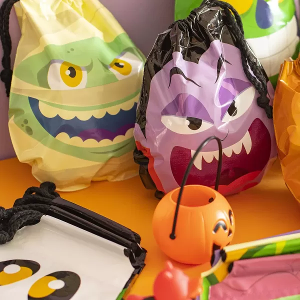 JOYIN 60PCS Halloween Drawstring Treat Bags Goodie Candy Trick or Treat Bags Bulk in 12 Cute Monster Designs Small Plastic Gifts Bags for Kids Trick or Treating Halloween Party Favors Supplies