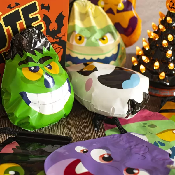JOYIN 60PCS Halloween Drawstring Treat Bags Goodie Candy Trick or Treat Bags Bulk in 12 Cute Monster Designs Small Plastic Gifts Bags for Kids Trick or Treating Halloween Party Favors Supplies