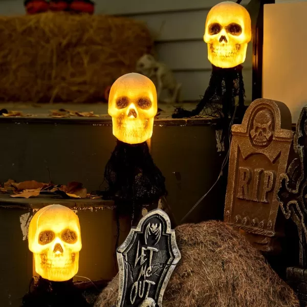 JOYIN 3 Pcs Halloween Skeleton Decorations Outdoor Light Up Halloween Graveyard Skull Stakes Pathway Makers for Halloween Party Lawn Props Yard Decor