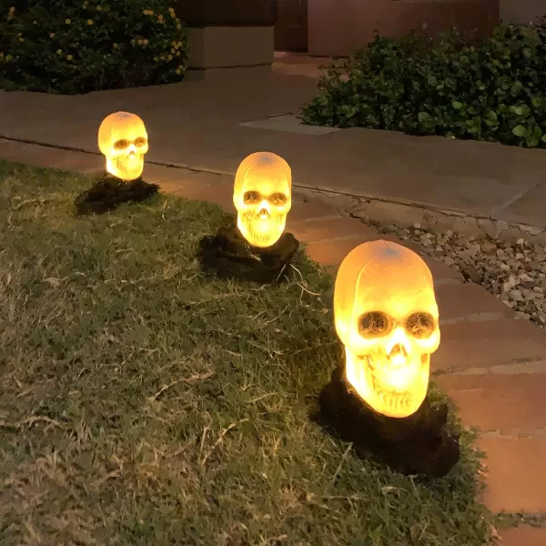JOYIN 3 Pcs Halloween Skeleton Decorations Outdoor Light Up Halloween Graveyard Skull Stakes Pathway Makers for Halloween Party Lawn Props Yard Decor