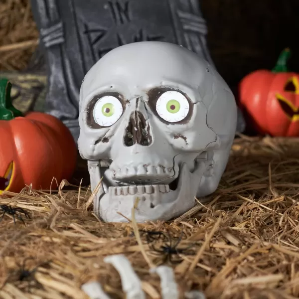 imageJOYIN Skull Halloween Decorations Indoor Table Desk Home Decor Haunted House Halloween Animatronics Sound Activated LED Lights Up Eyes Party Supplies Animated Skull Scary Moving Eyeballs