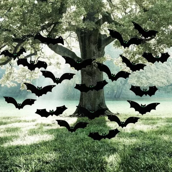 imageJOYIN 24 Pcs Bats Halloween Decorations Outdoor Indoor Flying Bats Glow in The Dark Halloween Hanging Decorations Decor Haunted House Front Party Supplies Favors Porch Tree Garden Yard Lawn