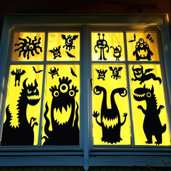 imageJOYIN 7 Pcs Halloween Monster Window Clings Stickers Silhouette Halloween Decorations Indoor Decor Funny Cute Monster Wall Window Decals Party Favors Supplies Novelty Haunted House