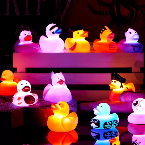 imageJOYIN 12 Pcs Glow Halloween Ducks Bath Toys LED Halloween Rubber Duckies for Kids Gift Glow in The Dark Party Favors Light Up Ducky Bulk Trick or Treats Classroom Prizes Decorations