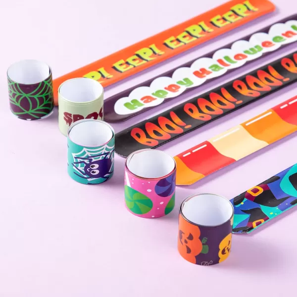 imageJOYIN 120 PCS Halloween Slap Bracelets Party Favors for Kids  24 Designs Bracelets for Halloween Decorations Halloween Treat Bag Stuffers Noncandy Gift