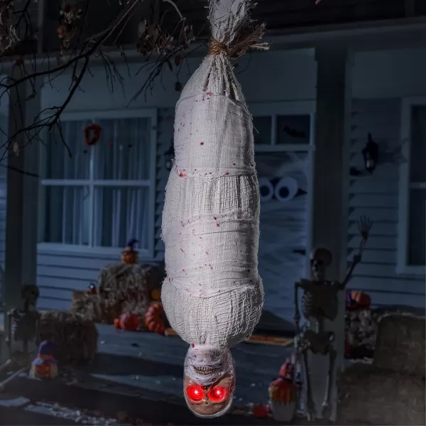 imageJOYIN 35quot Halloween Animated Hanging Corpse with LED Light Up Eyes ampamp Sound Effect for Indoor and Outdoor Decorations