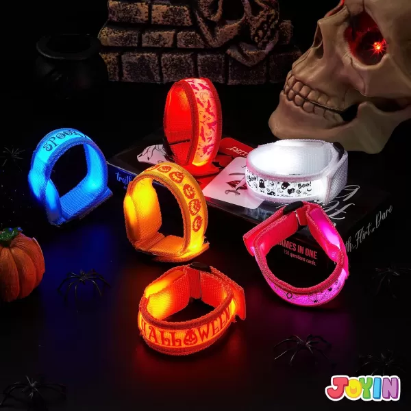 imageJOYIN 6 PCS Halloween Light Up Bracelets LED Glow Flashing Wristband Toys for Kids Glow in The Dark Slender Wrists Trick or Treat for Concerts Sports Night Events Game Prizes Party Favors
