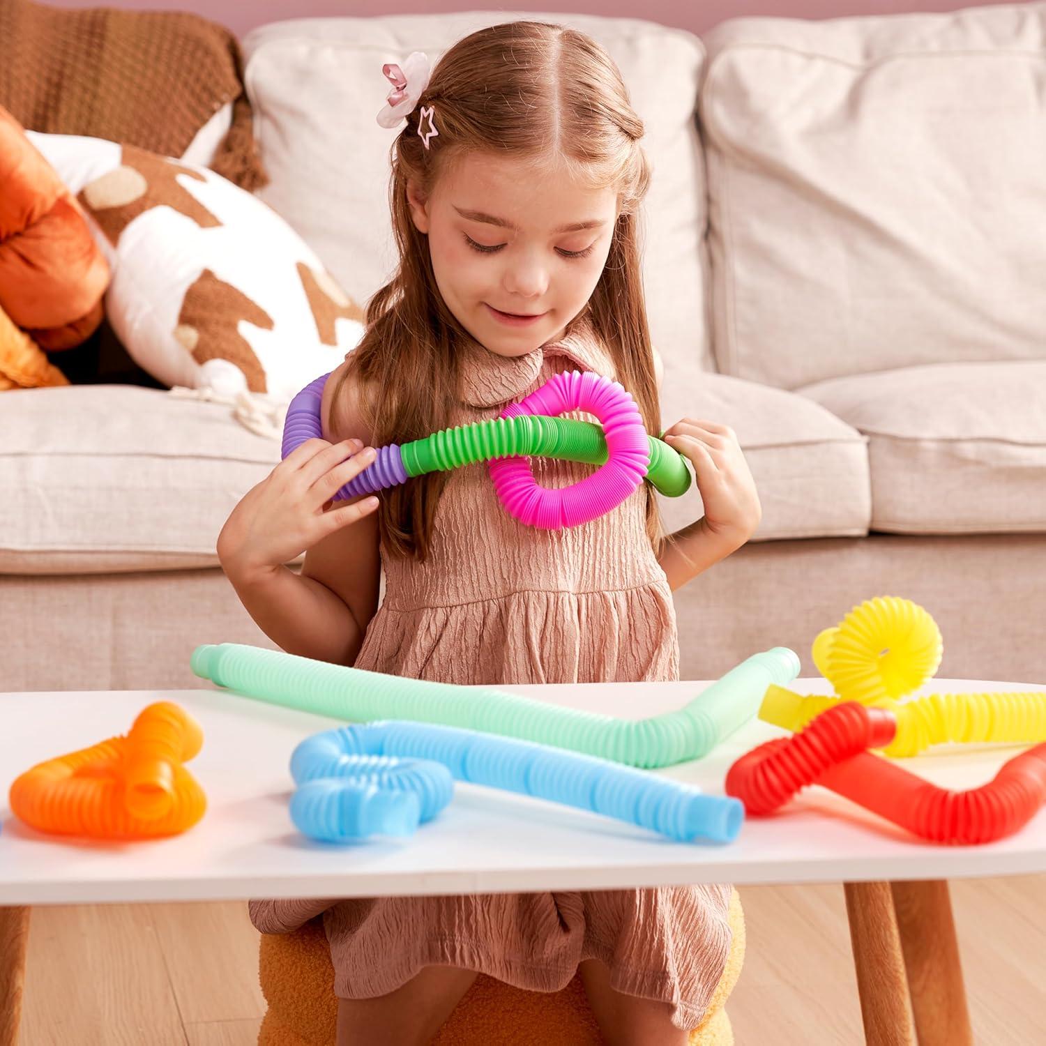 imageJOYIN 36 Pack Pop Tubes Sensory Toys Large Fidget Toys Party Favors  9 Colors Creativity Learning ampamp Fun for Toddler Kids  Perfect for Party Goodie Bags Stuffers Classroom School RewardLarge