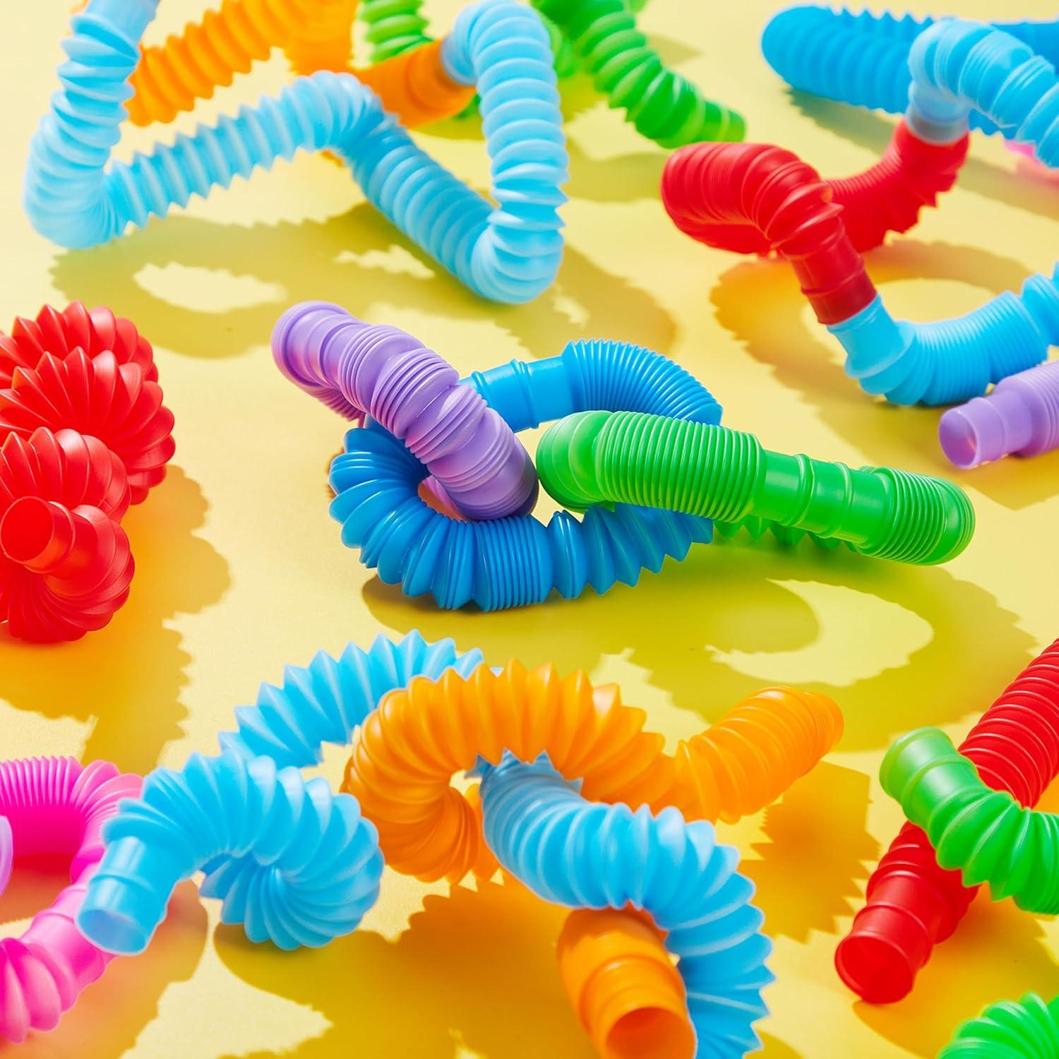 imageJOYIN 36 Pack Pop Tubes Sensory Toys Large Fidget Toys Party Favors  9 Colors Creativity Learning ampamp Fun for Toddler Kids  Perfect for Party Goodie Bags Stuffers Classroom School RewardSmall