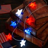 image:imageJOYIN 6 Pcs July 4th LED Star Bulb Necklaces Red White Blue Lightup Necklace with 6 Lighting Modes Patriotic Necklace for Independence Day Memorial Day Party Parade Masquerade Accessory Supply