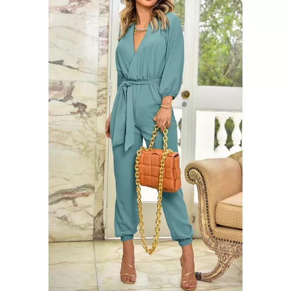 imagePRETTYGARDEN Womens 2024 Fall Jumpsuits Casual Dressy One Piece Outfits V Neck Long Sleeve Belt Pockets Long Pants RomperBlue Green