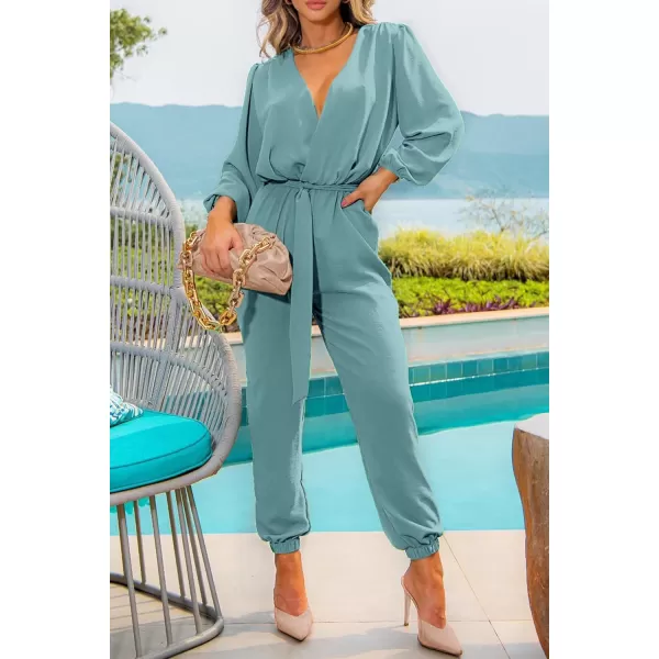 imagePRETTYGARDEN Womens 2024 Fall Jumpsuits Casual Dressy One Piece Outfits V Neck Long Sleeve Belt Pockets Long Pants RomperBlue Green