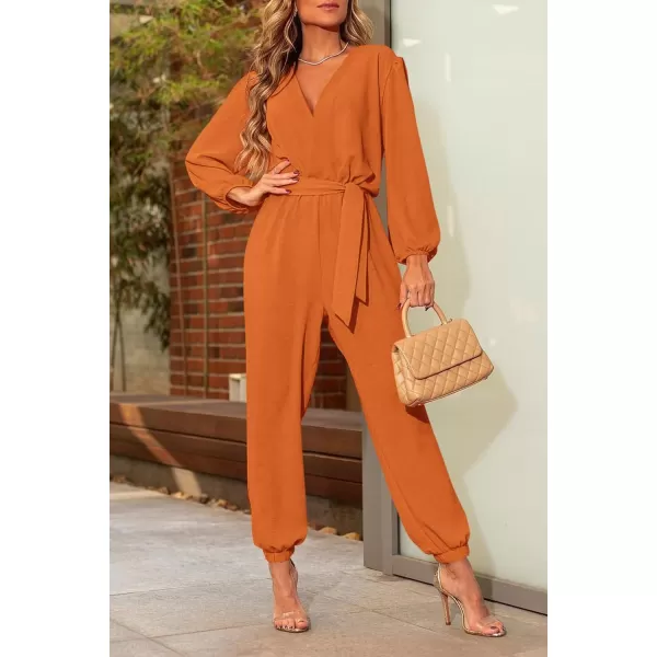 imagePRETTYGARDEN Womens 2024 Fall Jumpsuits Casual Dressy One Piece Outfits V Neck Long Sleeve Belt Pockets Long Pants RomperBrown Yellow