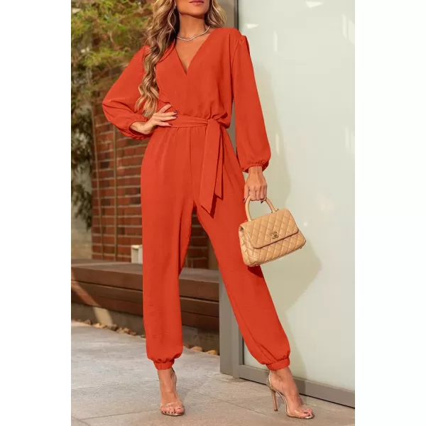 imagePRETTYGARDEN Womens 2024 Fall Jumpsuits Casual Dressy One Piece Outfits V Neck Long Sleeve Belt Pockets Long Pants RomperOrange