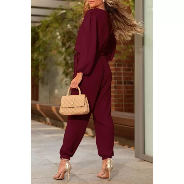 imagePRETTYGARDEN Womens 2024 Fall Jumpsuits Casual Dressy One Piece Outfits V Neck Long Sleeve Belt Pockets Long Pants RomperWine Red