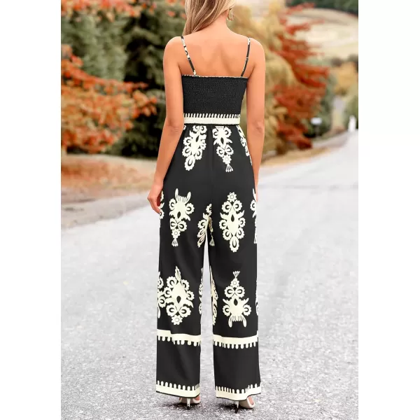 imagePRETTYGARDEN Womens Summer Boho Jumpsuits One Piece Beach Vacation Outfits Spaghetti Strap Wide Leg Pants RompersBlack