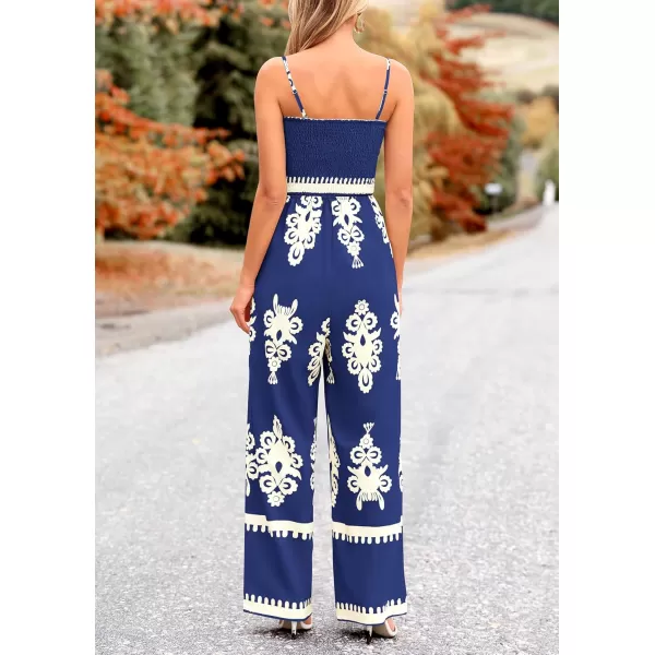 imagePRETTYGARDEN Womens Summer Boho Jumpsuits One Piece Beach Vacation Outfits Spaghetti Strap Wide Leg Pants RompersNavy