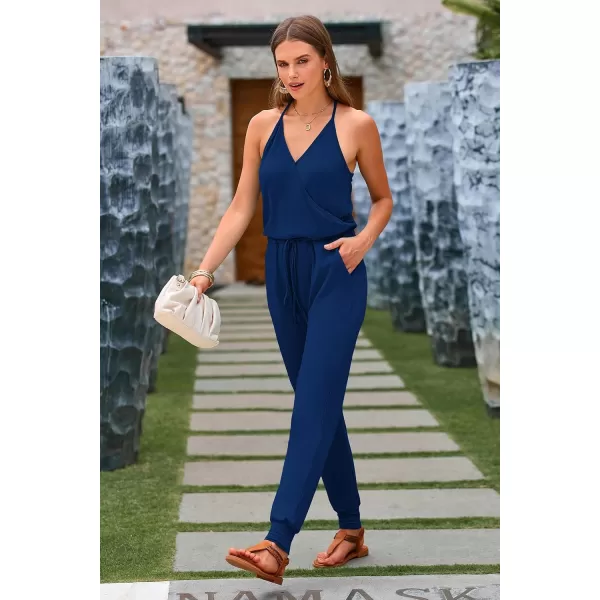 imagePRETTYGARDEN Womens Summer Casual Jumpsuits Wrap V Neck Sleeveless One Piece Pants Romper with PocketsDark Blue