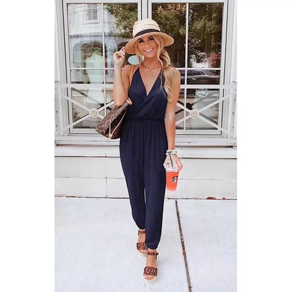 imagePRETTYGARDEN Womens Summer Casual Jumpsuits Wrap V Neck Sleeveless One Piece Pants Romper with PocketsNavy