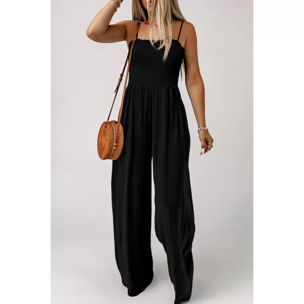 imagePRETTYGARDEN Womens Summer Jumpsuits Dressy Casual One Piece Outfits Linen Smocked Spaghetti Strap Pockets Wide Leg RompersBlack