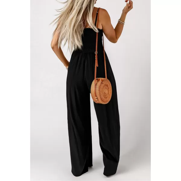 imagePRETTYGARDEN Womens Summer Jumpsuits Dressy Casual One Piece Outfits Linen Smocked Spaghetti Strap Pockets Wide Leg RompersBlack