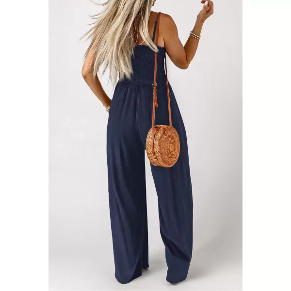 imagePRETTYGARDEN Womens Summer Jumpsuits Dressy Casual One Piece Outfits Linen Smocked Spaghetti Strap Pockets Wide Leg RompersNavy