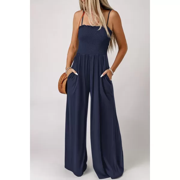 imagePRETTYGARDEN Womens Summer Jumpsuits Dressy Casual One Piece Outfits Linen Smocked Spaghetti Strap Pockets Wide Leg RompersNavy