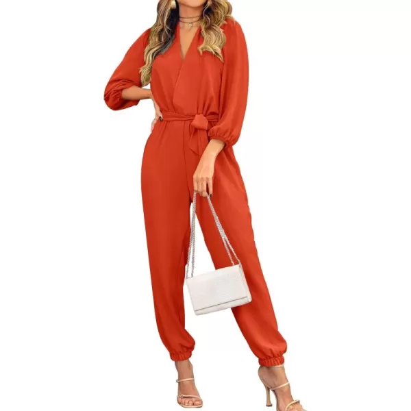imagePRETTYGARDEN Womens 2024 Fall Jumpsuits Casual Dressy One Piece Outfits V Neck Long Sleeve Belt Pockets Long Pants RomperOrange