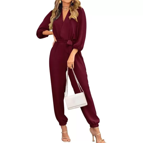 imagePRETTYGARDEN Womens 2024 Fall Jumpsuits Casual Dressy One Piece Outfits V Neck Long Sleeve Belt Pockets Long Pants RomperWine Red