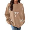 imagePRETTYGARDEN Fall Long Sleeve Pullover Sweaters for Women 2025 Trendy Crewneck Casual Cute Bow Chunky Knit Oversized SweaterCamel