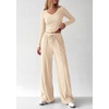 image:imagePRETTYGARDEN Womens 2 Piece Lounge Sets Matching Clothing  V Neck Long Sleeve Tops Wide Leg Pants Pockets Airport Travel Outfits Soft Ribbed Knit Drawstring Waist Fall Resort WearBeige