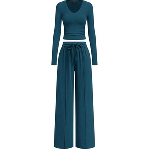 image:imagePRETTYGARDEN Womens 2 Piece Lounge Sets Matching Clothing  V Neck Long Sleeve Tops Wide Leg Pants Pockets Airport Travel Outfits Soft Ribbed Knit Drawstring Waist Fall Resort WearLake Blue
