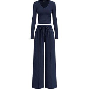 image:imagePRETTYGARDEN Womens 2 Piece Lounge Sets Matching Clothing  V Neck Long Sleeve Tops Wide Leg Pants Pockets Airport Travel Outfits Soft Ribbed Knit Drawstring Waist Fall Resort WearNavy Blue