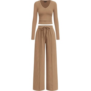 image:imagePRETTYGARDEN Womens 2 Piece Lounge Sets Matching Clothing  V Neck Long Sleeve Tops Wide Leg Pants Pockets Airport Travel Outfits Soft Ribbed Knit Drawstring Waist Fall Resort WearCamel