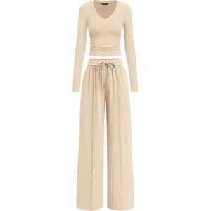 image:imagePRETTYGARDEN Womens 2 Piece Lounge Sets Matching Clothing  V Neck Long Sleeve Tops Wide Leg Pants Pockets Airport Travel Outfits Soft Ribbed Knit Drawstring Waist Fall Resort WearBeige