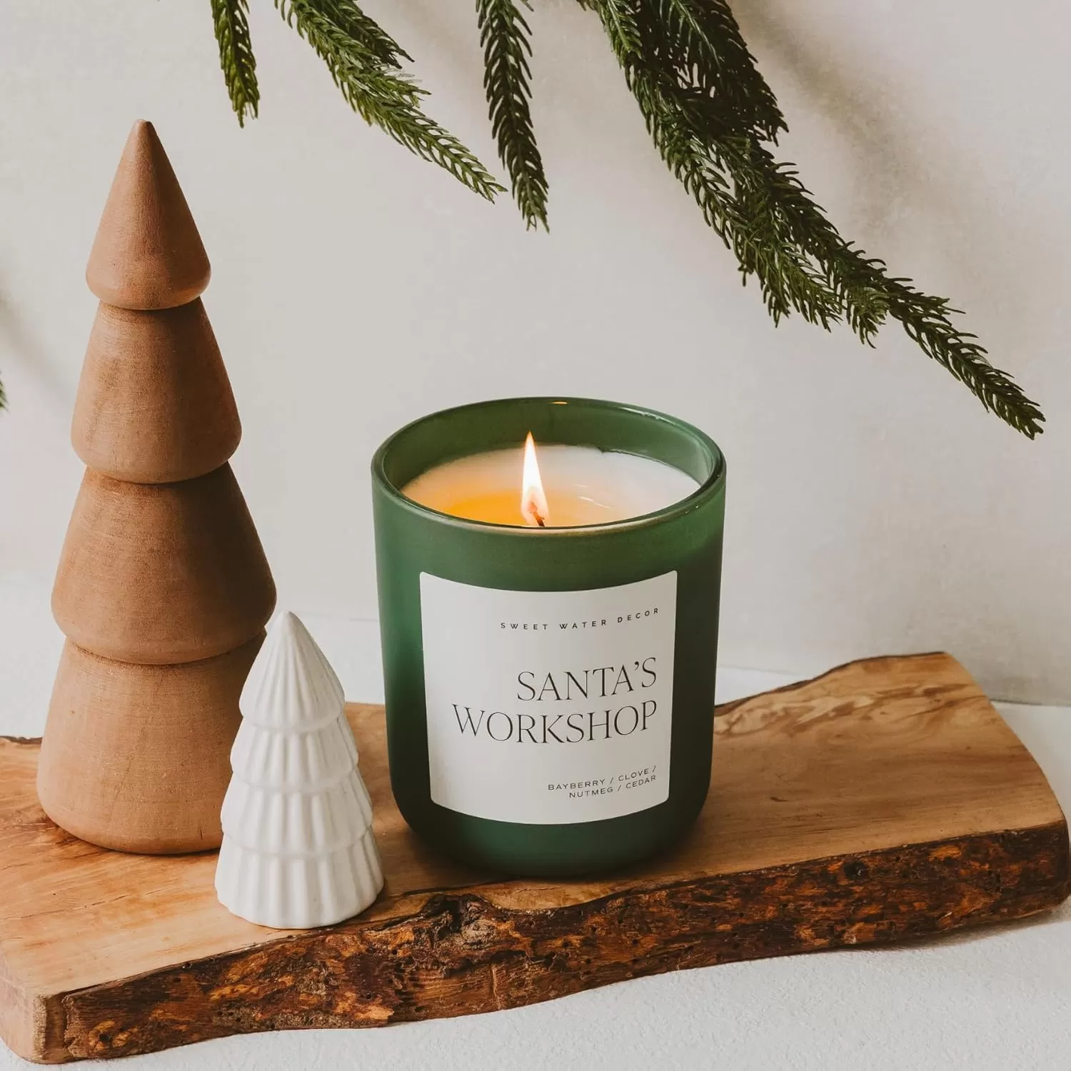 imageSweet Water Decor By The Fireside Candle  Vanilla Caramel Amber Tonka Smoky Woods Musk Winter Scented Soy Candles for Home  15oz Tan Jar 70 Hour Burn Time Made in the USAGreen