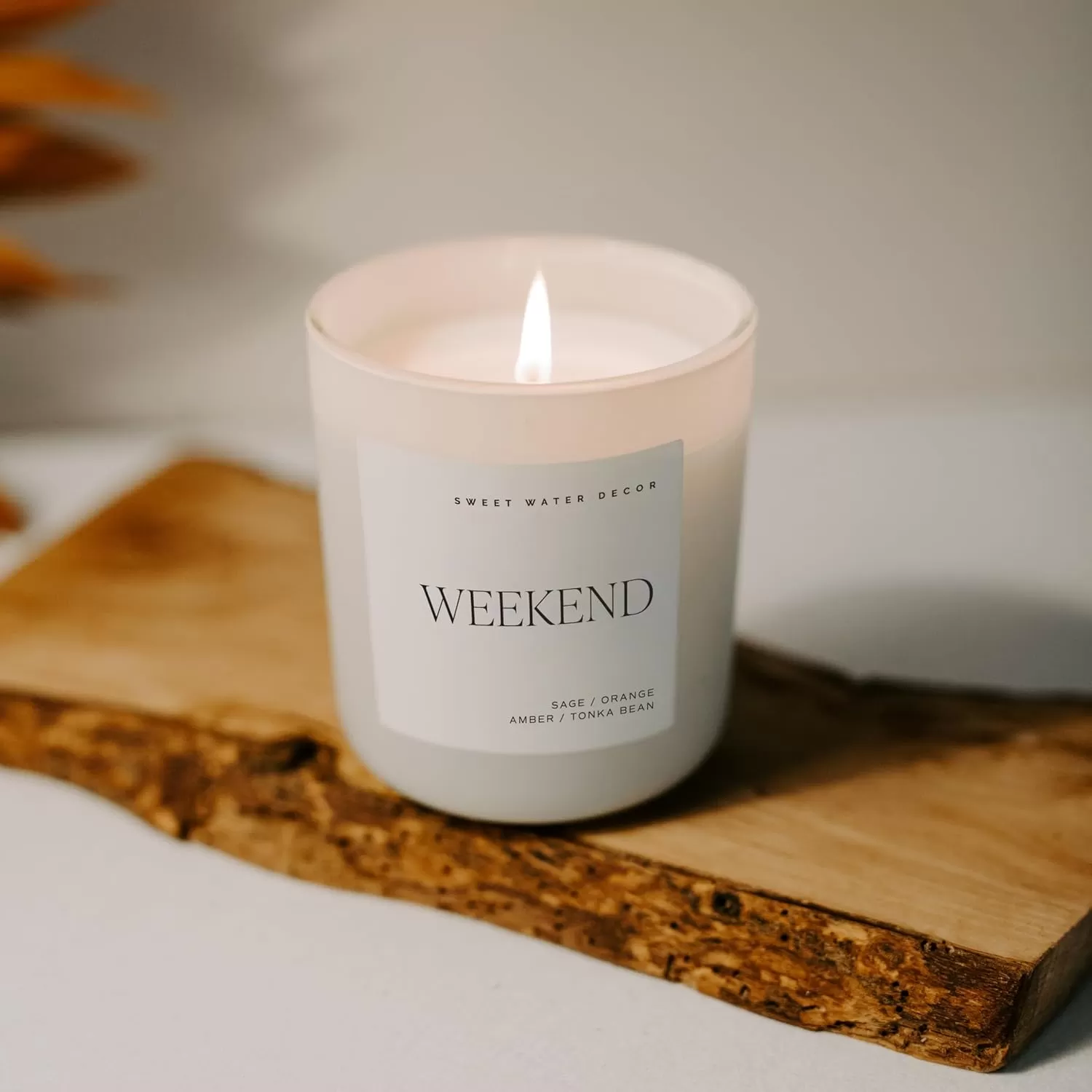 imageSweet Water Decor By The Fireside Candle  Vanilla Caramel Amber Tonka Smoky Woods Musk Winter Scented Soy Candles for Home  15oz Tan Jar 70 Hour Burn Time Made in the USATan