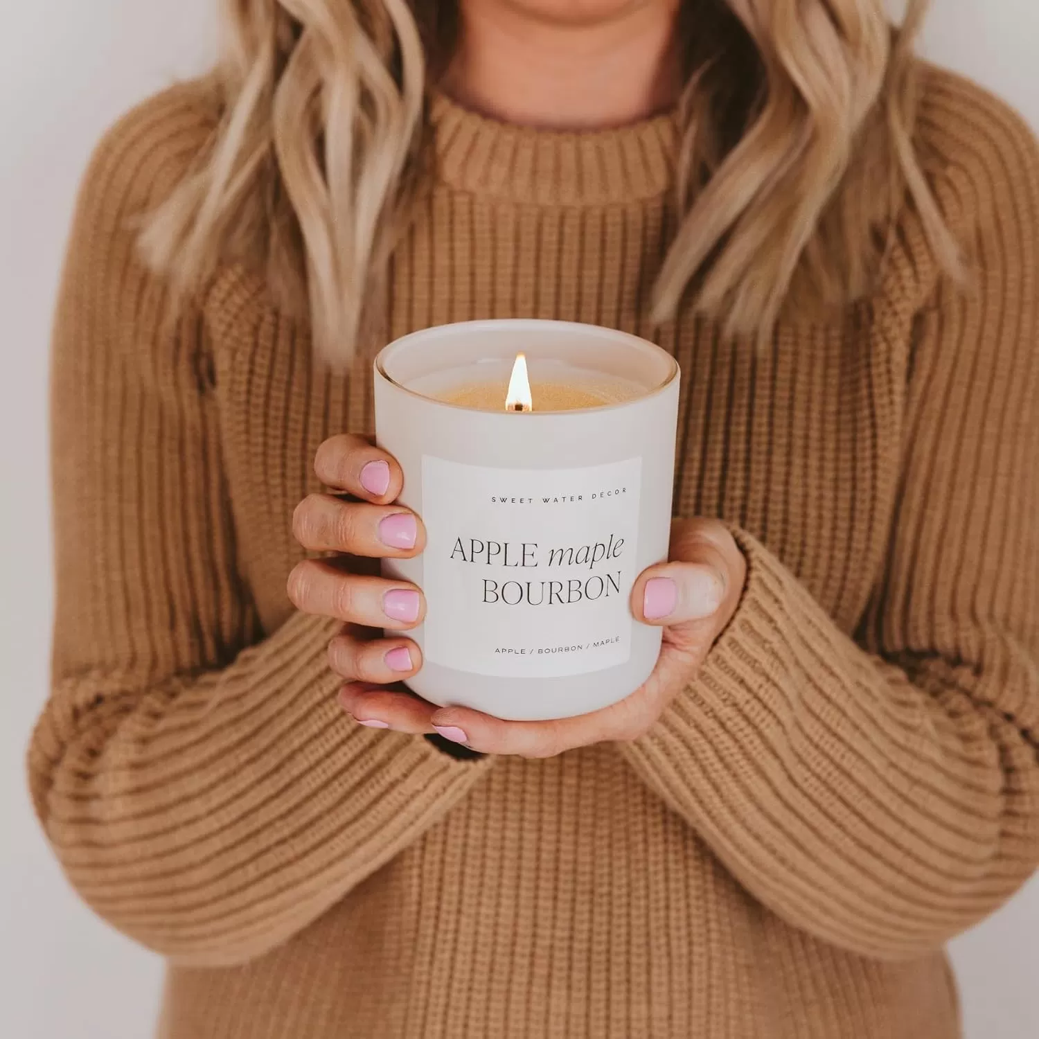 imageSweet Water Decor By The Fireside Candle  Vanilla Caramel Amber Tonka Smoky Woods Musk Winter Scented Soy Candles for Home  15oz Tan Jar 70 Hour Burn Time Made in the USATan
