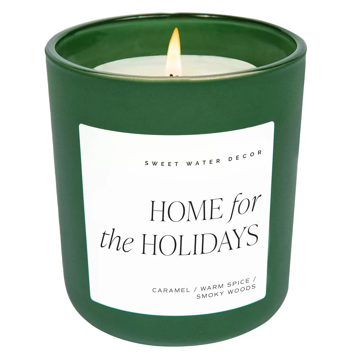 imageSweet Water Decor By The Fireside Candle  Vanilla Caramel Amber Tonka Smoky Woods Musk Winter Scented Soy Candles for Home  15oz Tan Jar 70 Hour Burn Time Made in the USAGreen