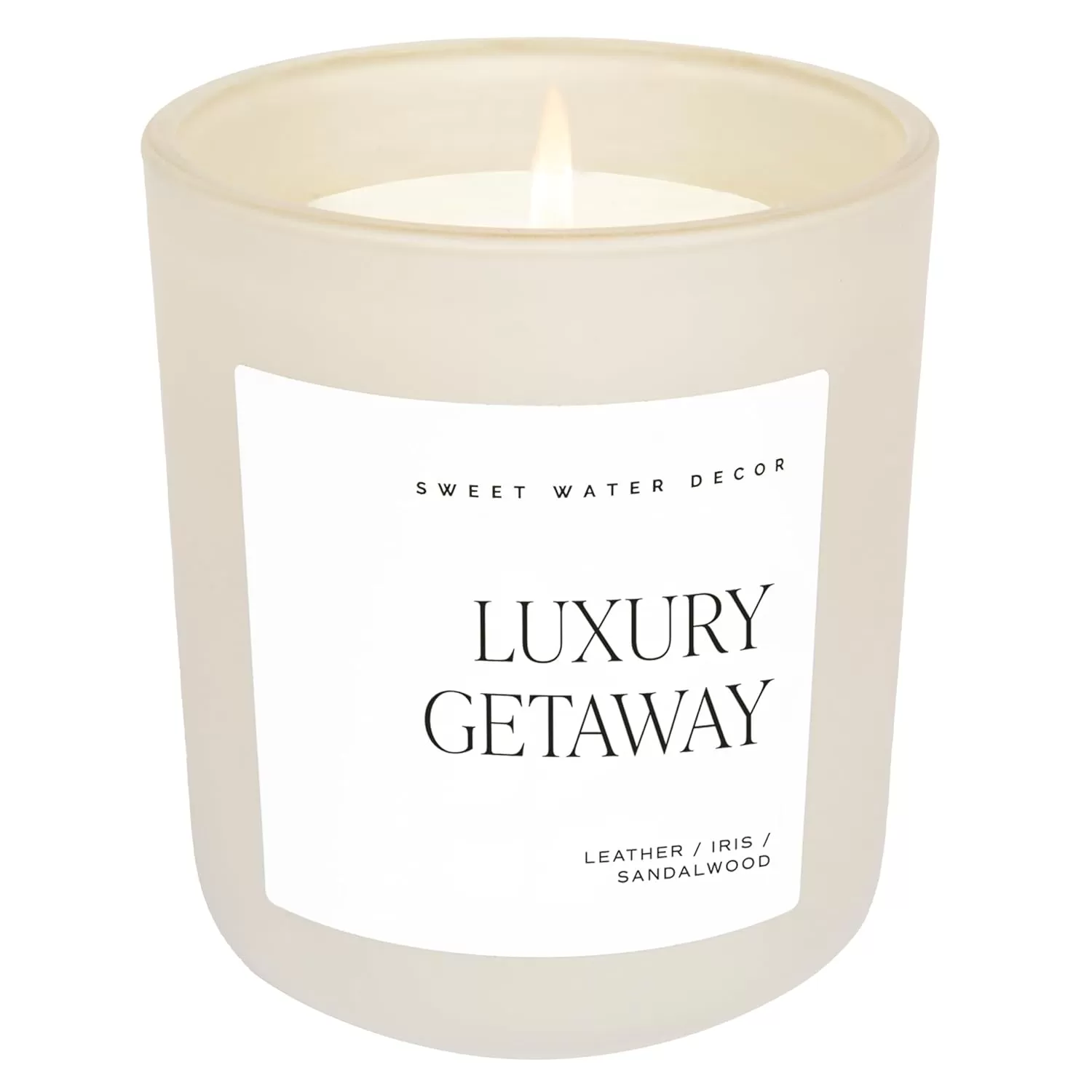 imageSweet Water Decor By The Fireside Candle  Vanilla Caramel Amber Tonka Smoky Woods Musk Winter Scented Soy Candles for Home  15oz Tan Jar 70 Hour Burn Time Made in the USATan