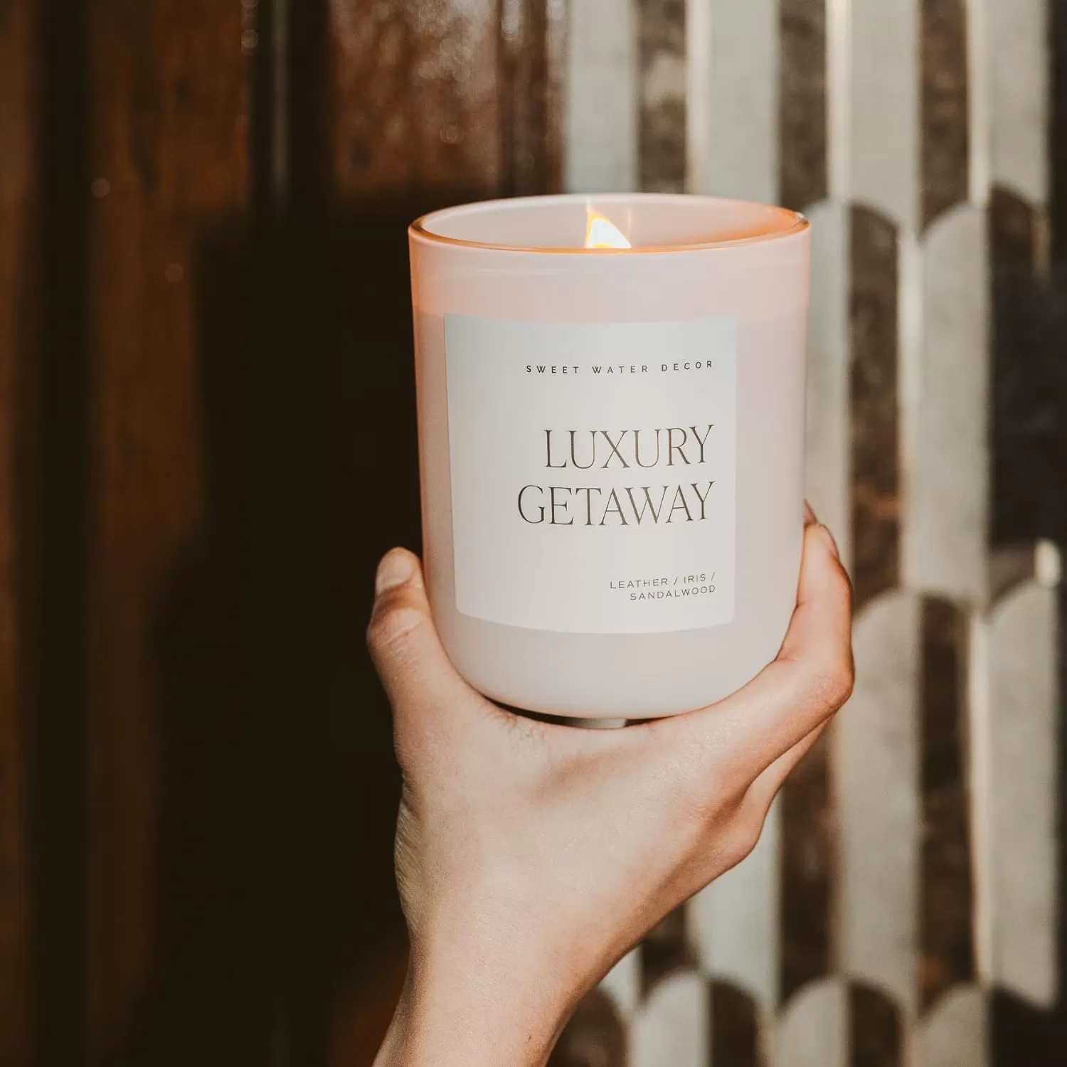 imageSweet Water Decor By The Fireside Candle  Vanilla Caramel Amber Tonka Smoky Woods Musk Winter Scented Soy Candles for Home  15oz Tan Jar 70 Hour Burn Time Made in the USATan