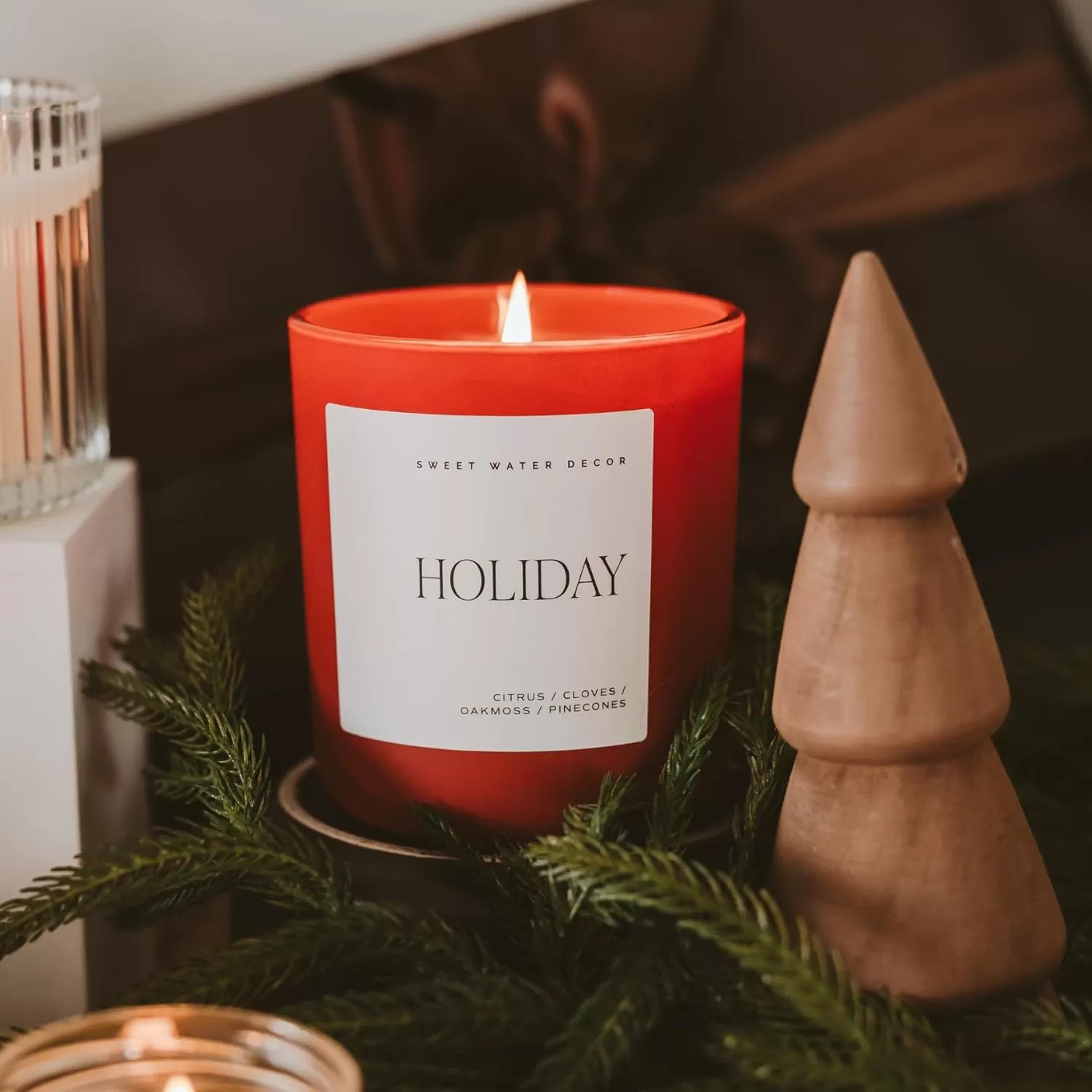 imageSweet Water Decor By The Fireside Candle  Vanilla Caramel Amber Tonka Smoky Woods Musk Winter Scented Soy Candles for Home  15oz Tan Jar 70 Hour Burn Time Made in the USARed