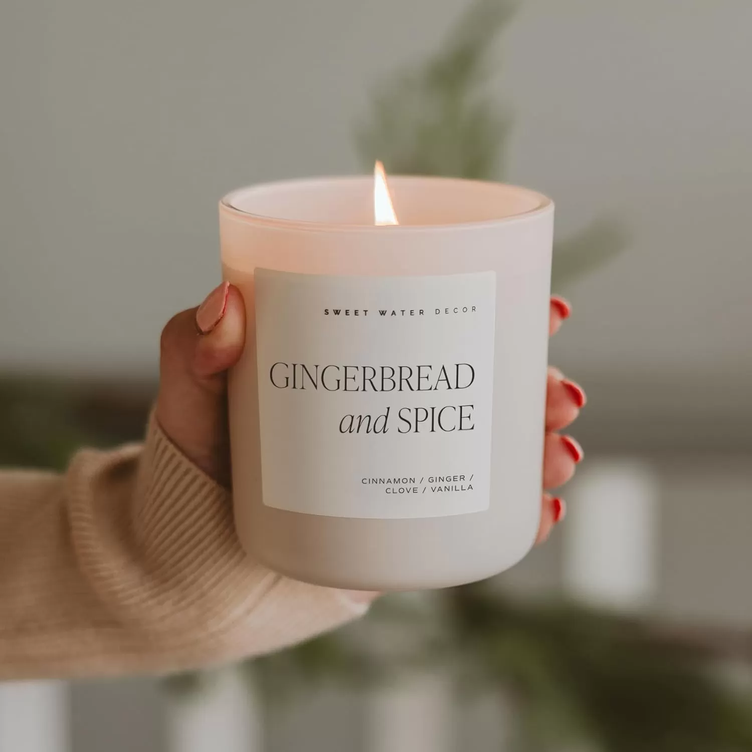 imageSweet Water Decor By The Fireside Candle  Vanilla Caramel Amber Tonka Smoky Woods Musk Winter Scented Soy Candles for Home  15oz Tan Jar 70 Hour Burn Time Made in the USATan