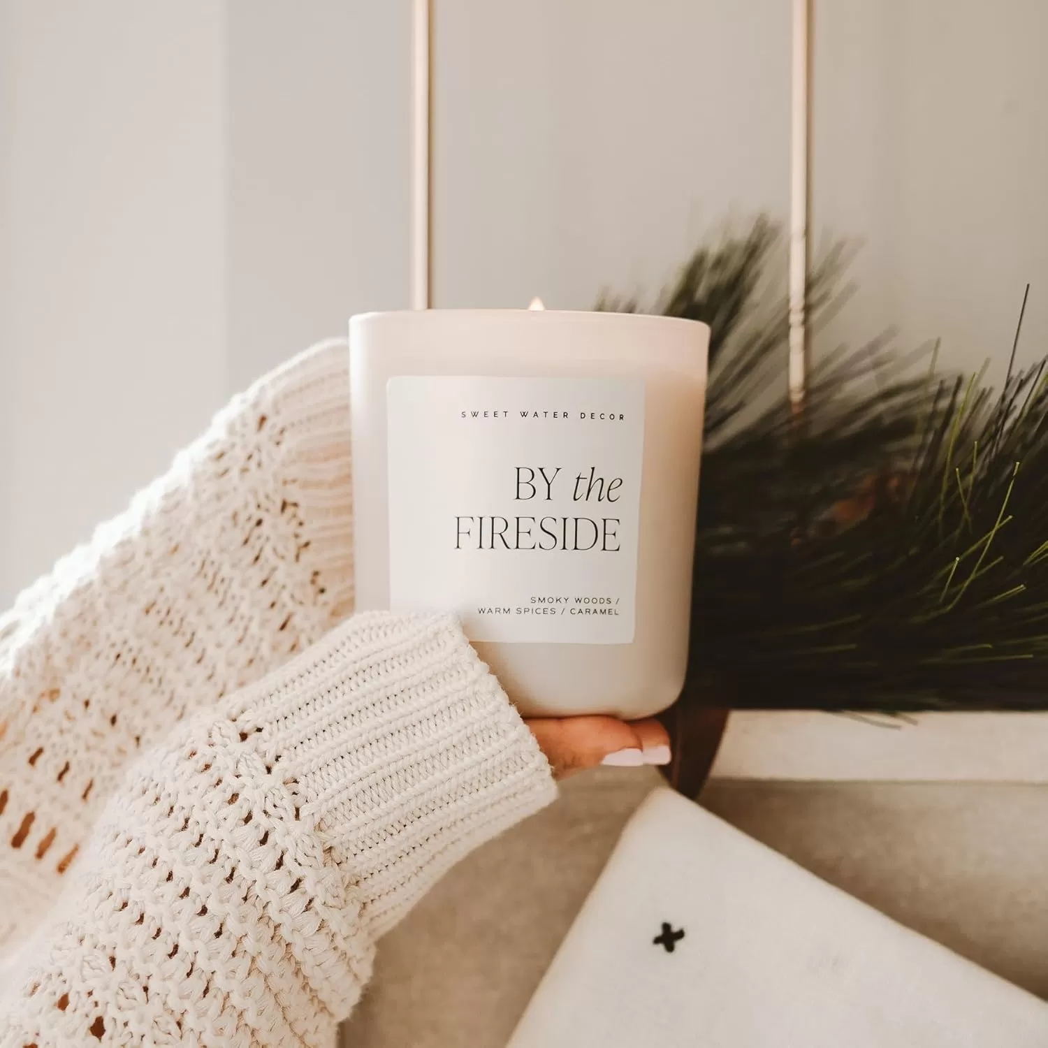 imageSweet Water Decor By The Fireside Candle  Vanilla Caramel Amber Tonka Smoky Woods Musk Winter Scented Soy Candles for Home  15oz Tan Jar 70 Hour Burn Time Made in the USATan