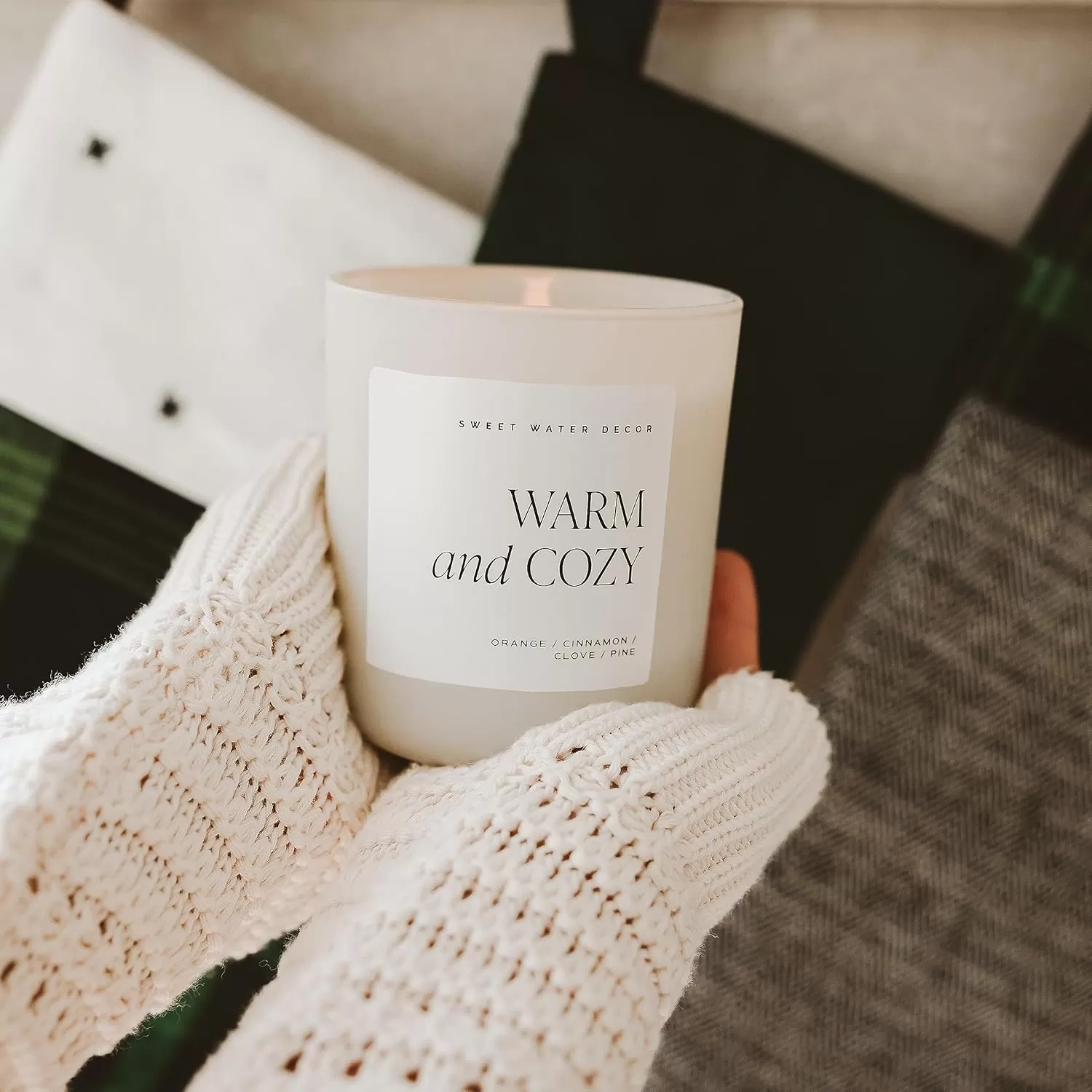 imageSweet Water Decor By The Fireside Candle  Vanilla Caramel Amber Tonka Smoky Woods Musk Winter Scented Soy Candles for Home  15oz Tan Jar 70 Hour Burn Time Made in the USATan